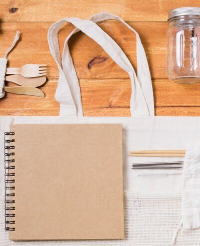 zero-waste-assortment-wooden-background_- ecofriendly promotional gifts dubai