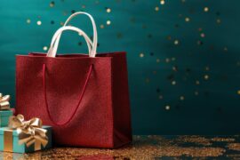 christmas-shopping-display-with-colorful-bag-sparkling-decorations_-