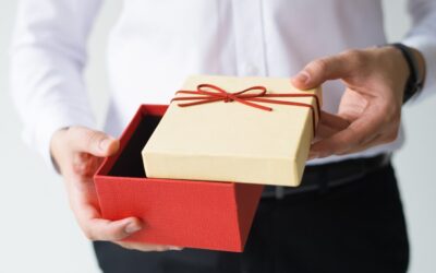 closeup-business-man-opening-gift-box_-
