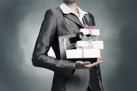 depositphotos_-stock-photo-businesswoman-receiving-or-presenting-gifts