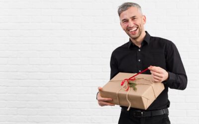 man-black-suit-unwrapping-gift-smiles_-