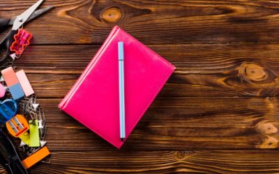 pen-notebook-near-stationery_-