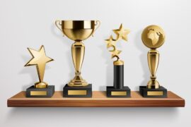 realistic-shiny-golden-trophy-awards-wooden-shelf-grey-background-vector-illustration_-
