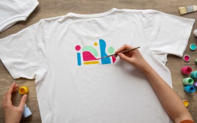 top-view-hands-painting-t-shirt-still-life_-