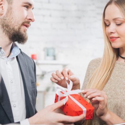 woman-opening-gift-box-from-boyfriend_-