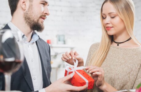 woman-opening-gift-box-from-boyfriend_-