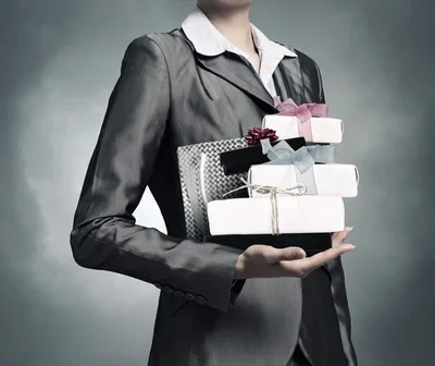 depositphotos_-stock-photo-businesswoman-receiving-or-presenting-gifts