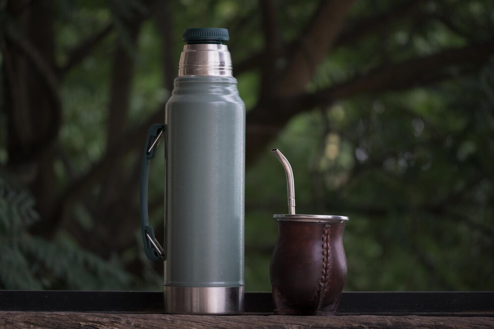 selective-focus-shot-thermos-with-cup_-