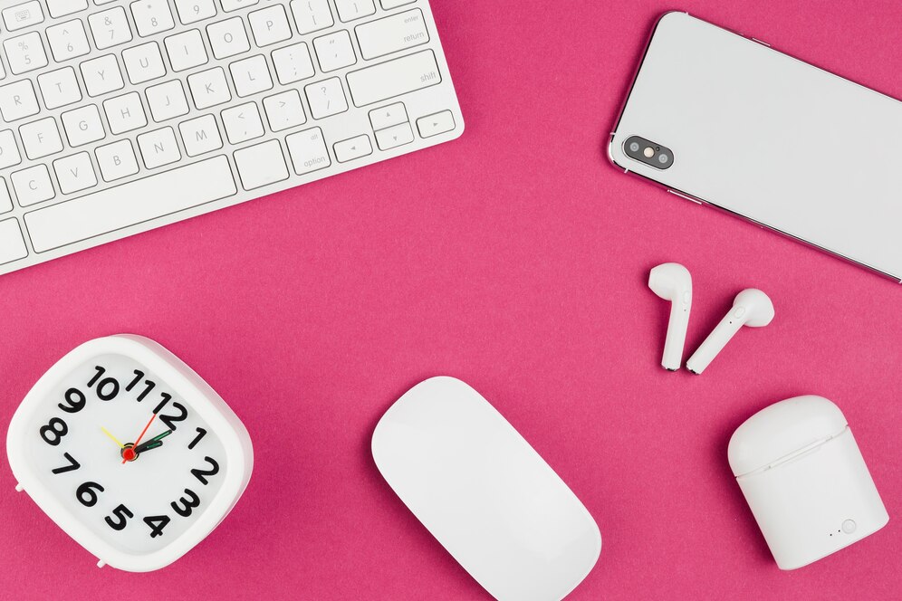 top-view-desk-with-mouse-clock_-