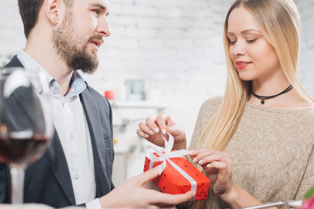 woman-opening-gift-box-from-boyfriend_-